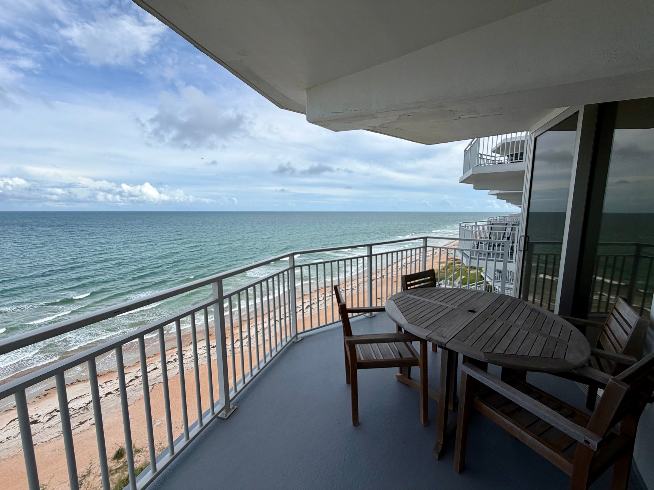 Ocean and beach view from a private Surfside Club North balcony