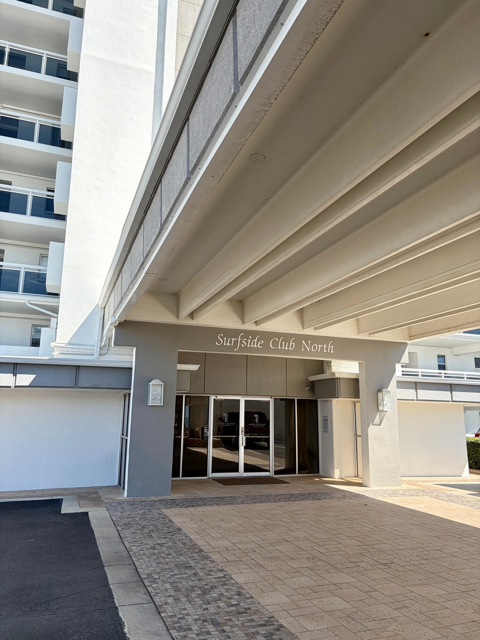 Surfside Club North covered entrance and front doors